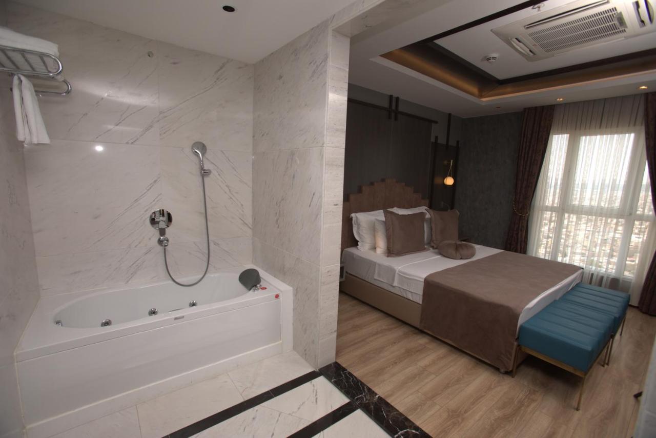 The Green Park Gaziantep Exterior foto A bathroom in a hotel room